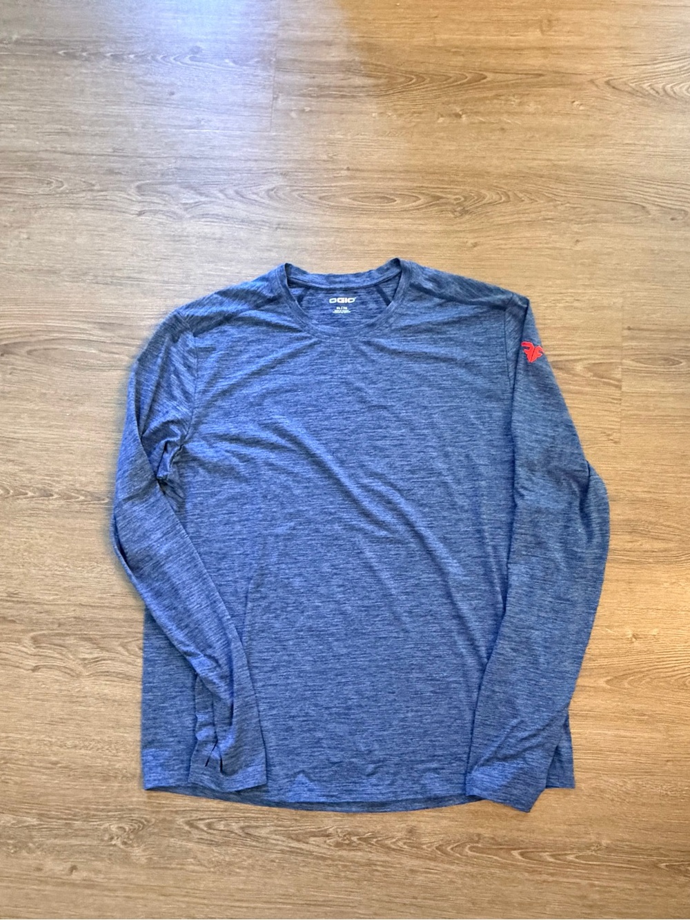 OGIO Men's Long Sleeve Performance Heathered Navy Shirt with Red Sleeve Logo